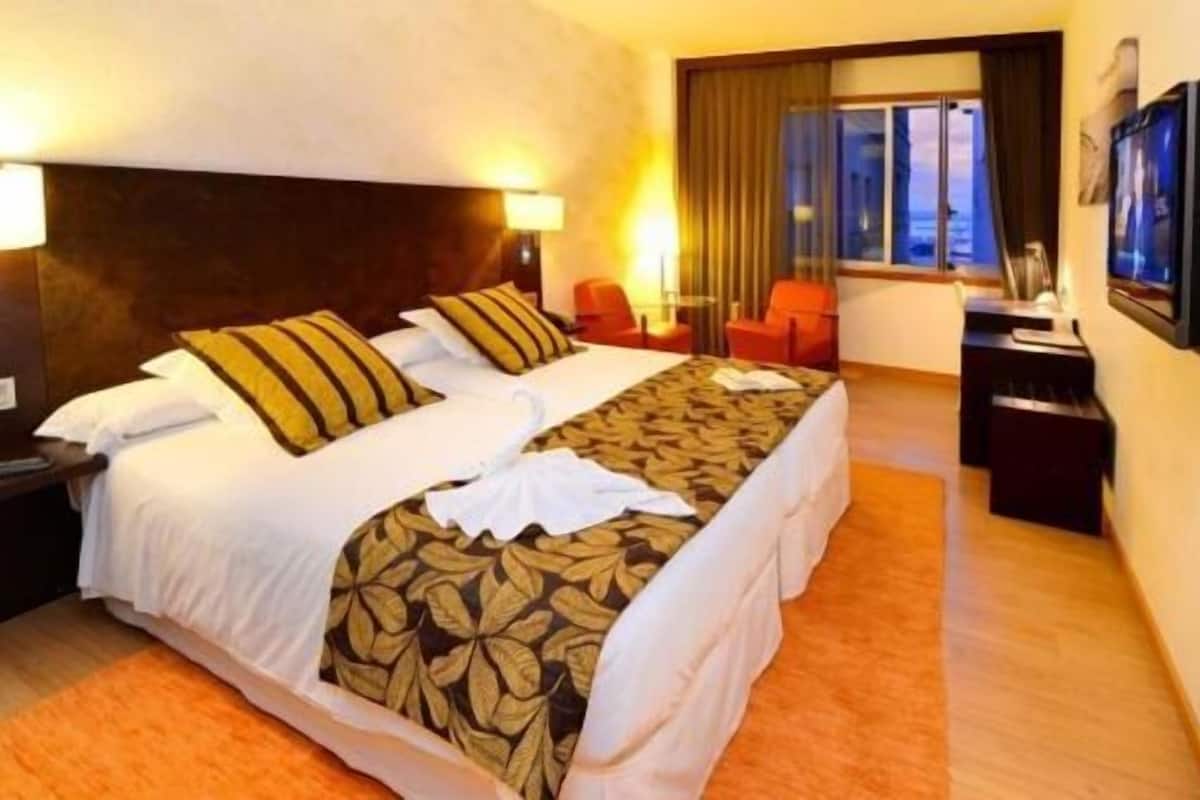 1 slaapkamer, een minibar, een kluis op de kamer, een bureau