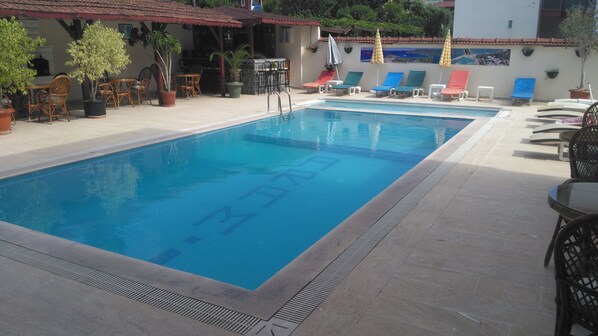 Outdoor pool, pool umbrellas, pool loungers