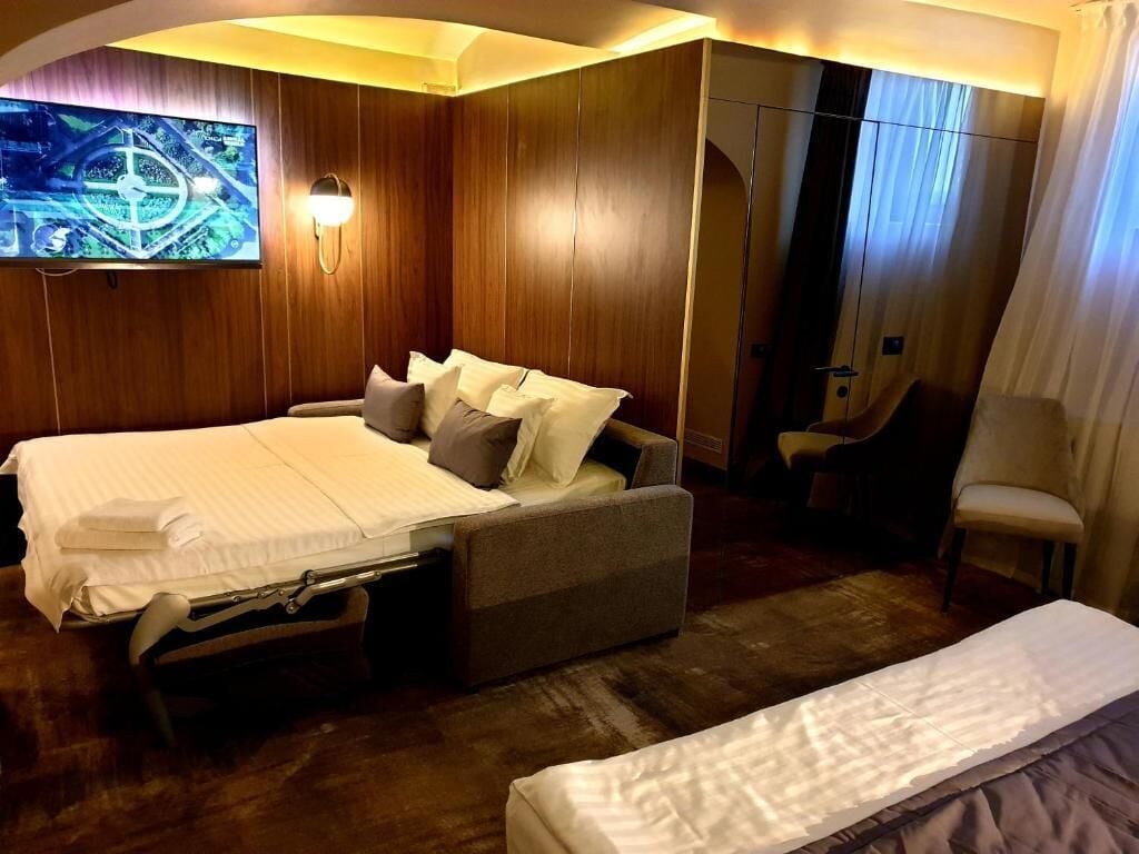 Standard Quadruple Room | Premium bedding, desk, laptop workspace, blackout drapes