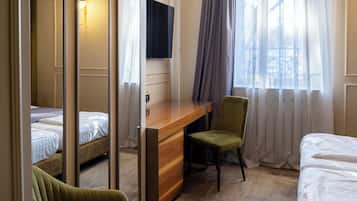 Premium bedding, individually decorated, desk, laptop workspace