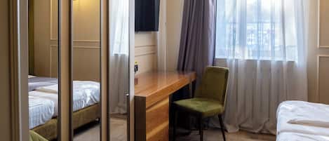 Premium bedding, individually decorated, desk, laptop workspace