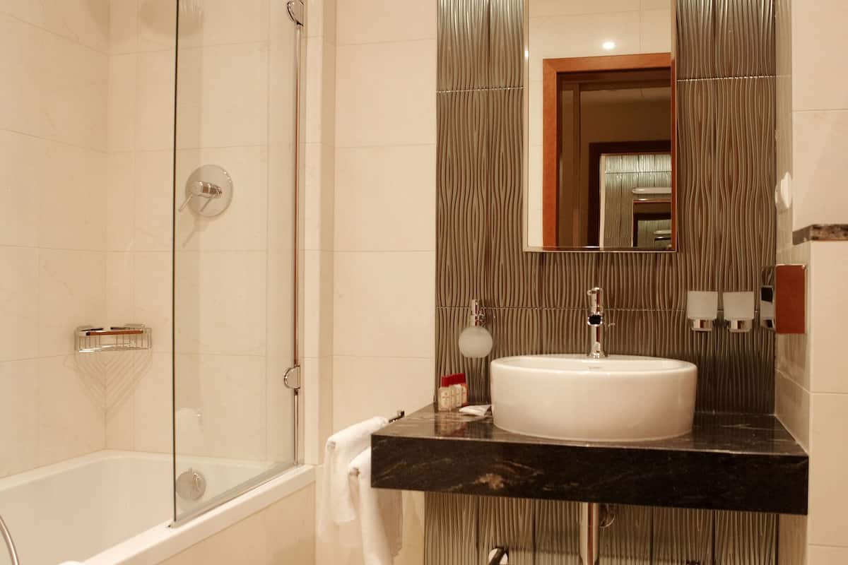 superior double room | bathroom | free toiletries, hair dryer, towels