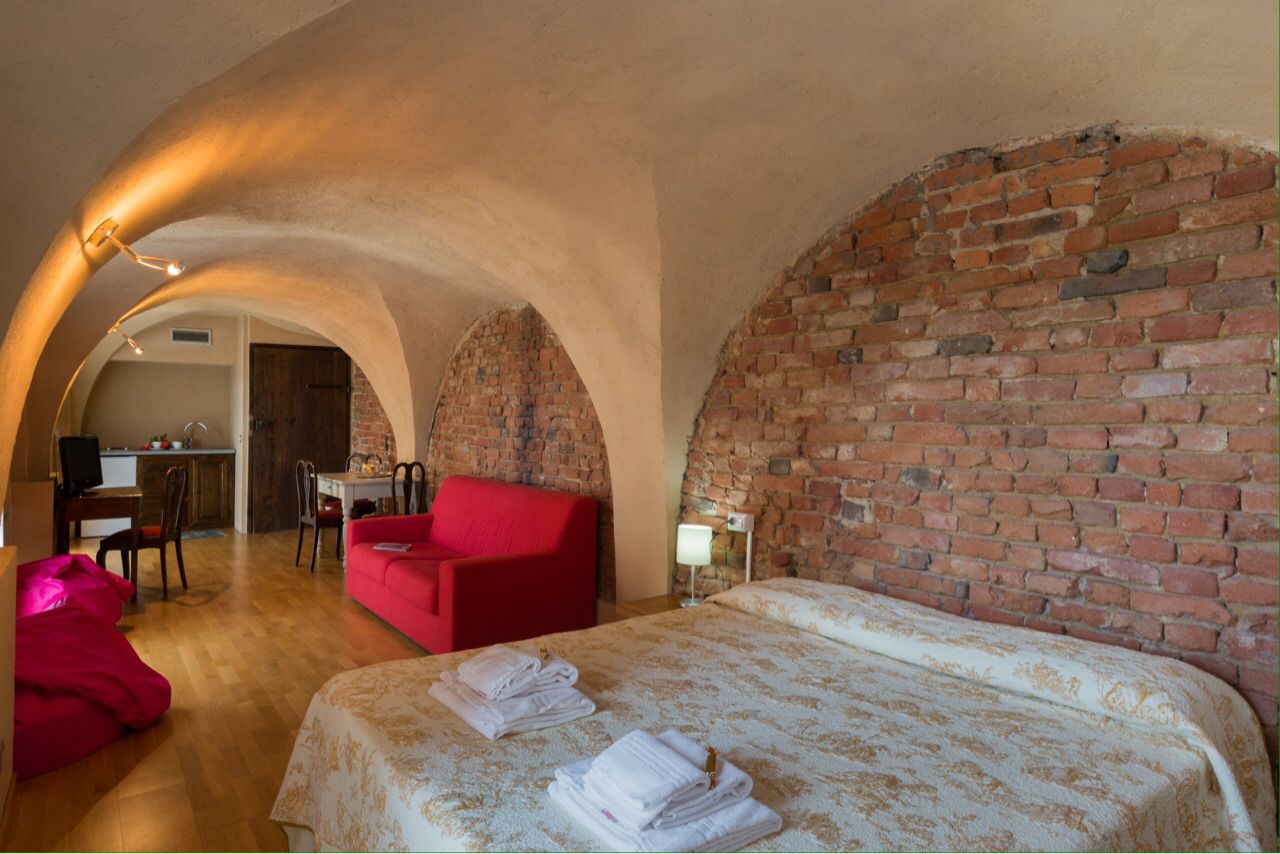 Superior-Suite, 1 Schlafzimmer, Küche, Blick auf den Innenhof | Wohnzimmer | Flachbildfernseher