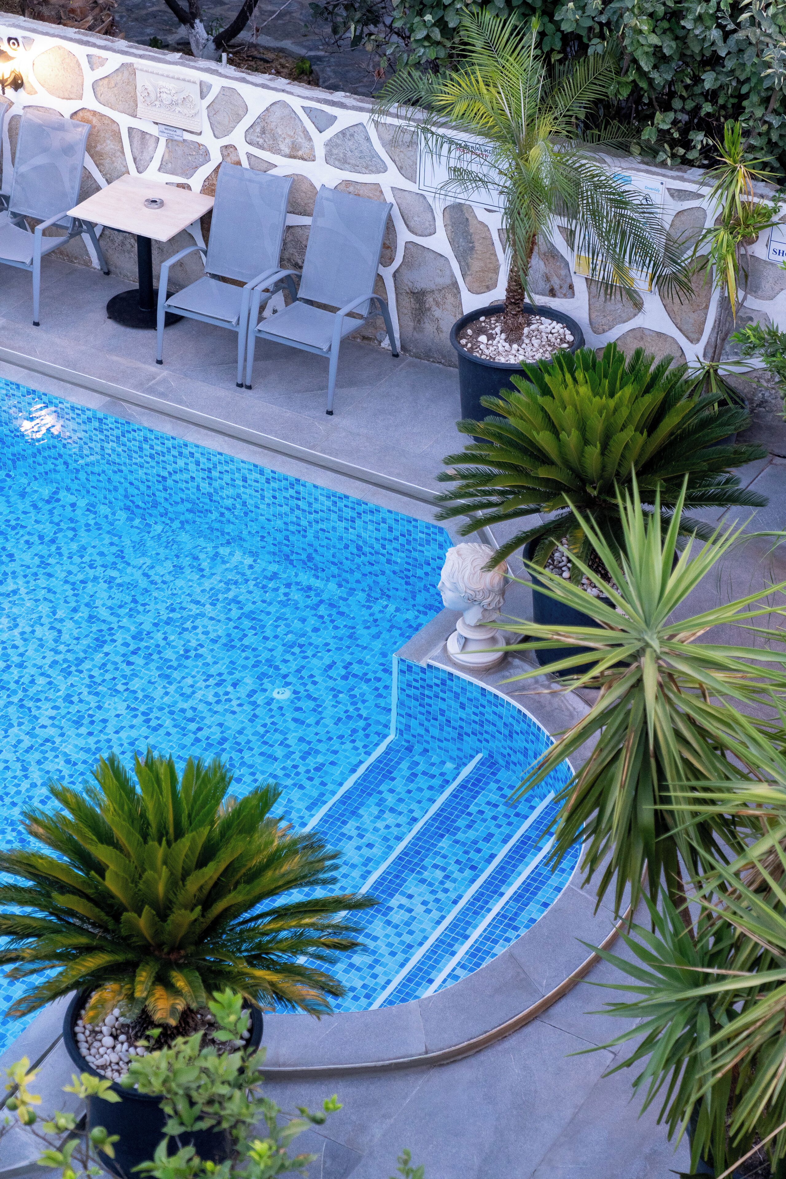 outdoor pool, pool umbrellas, pool loungers