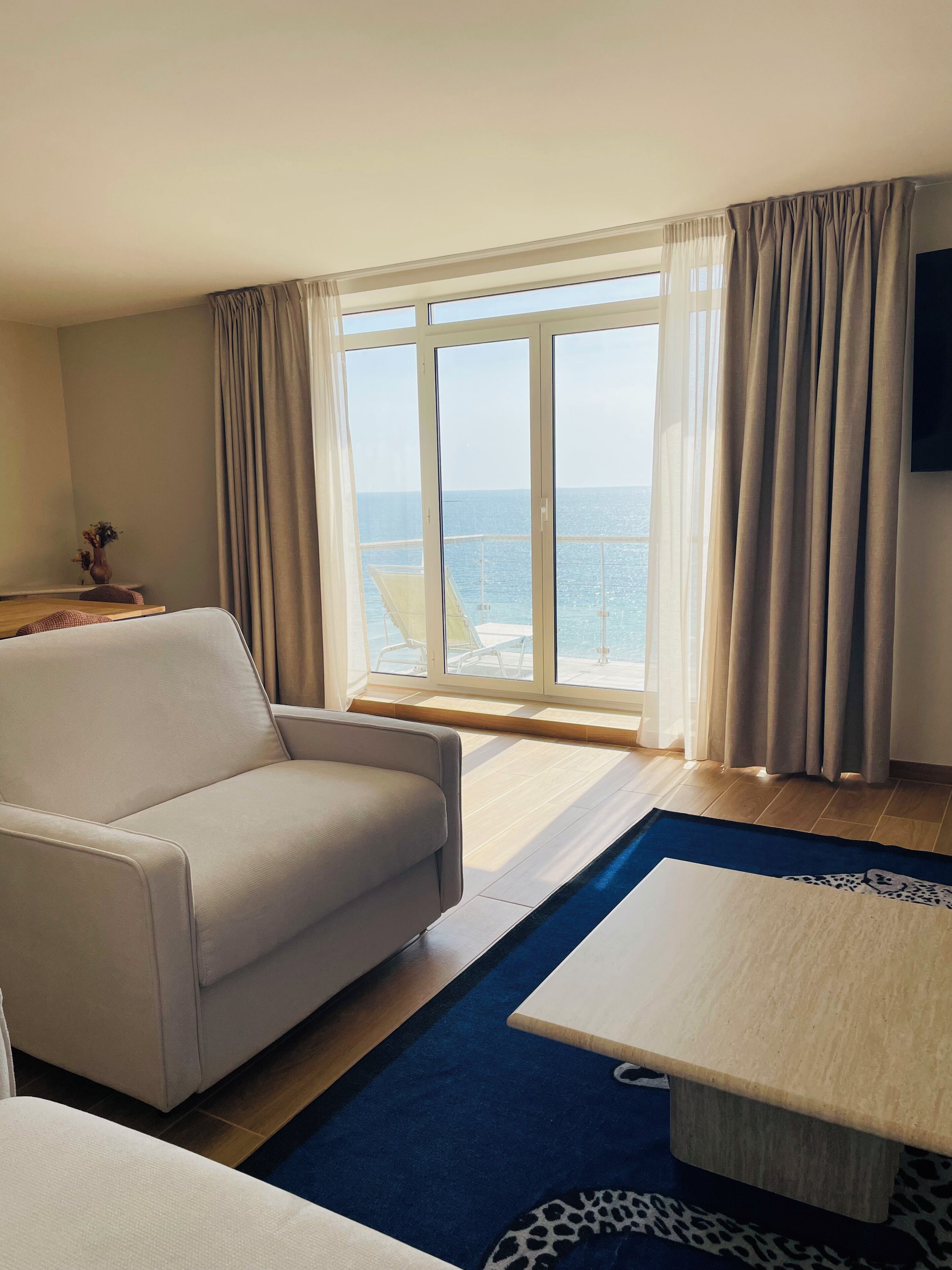 Executive Suite, Sea View | Living area | LED TV