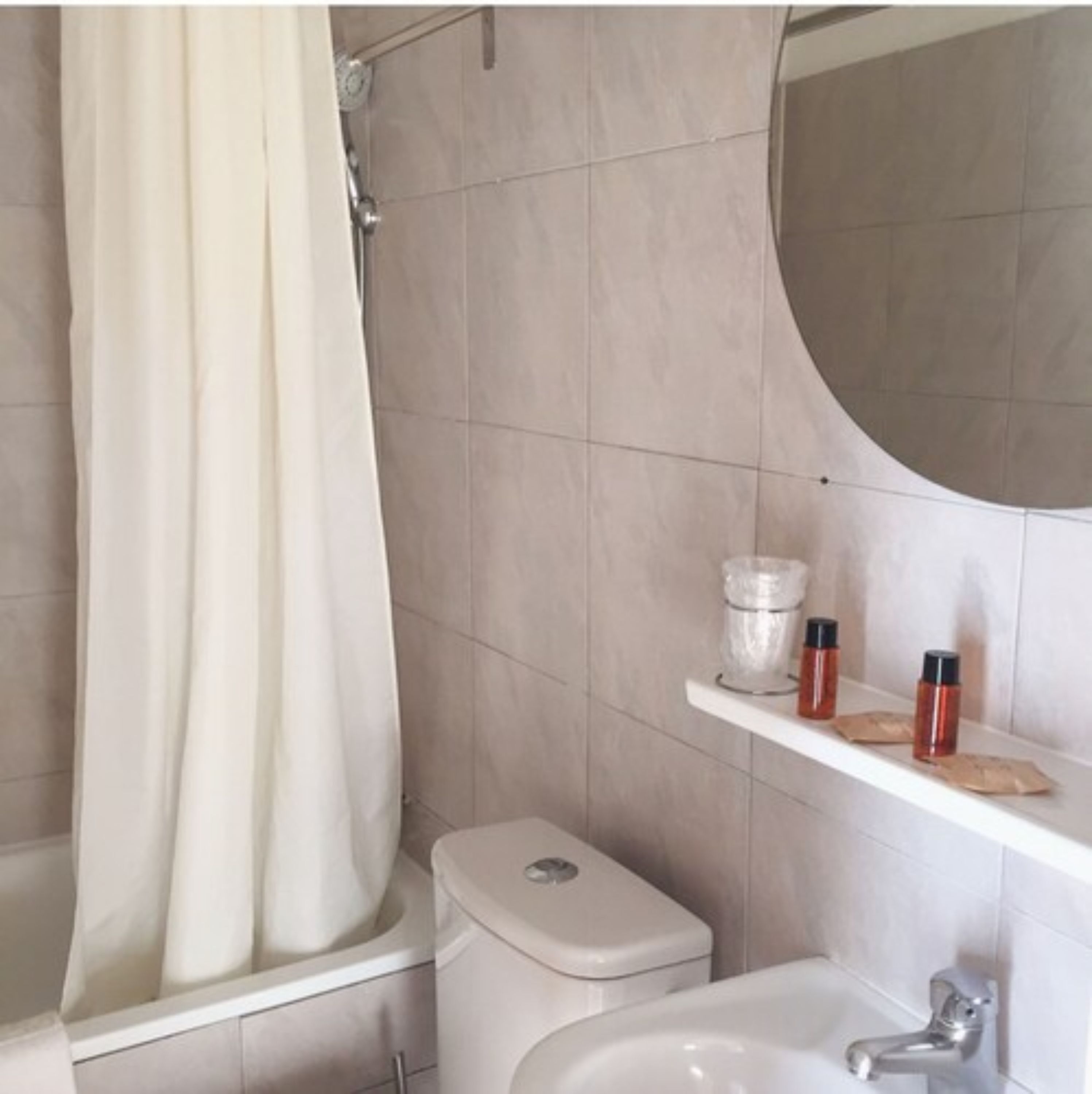 standard double room | bathroom | shower, hair dryer, towels