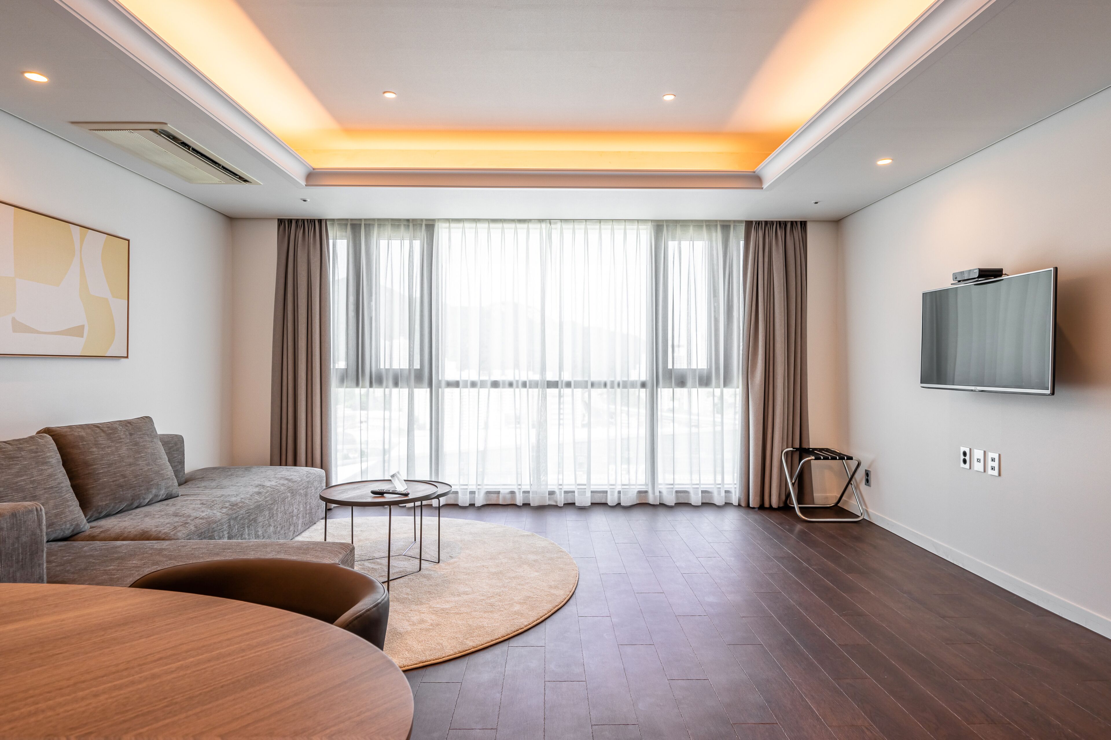 family suite (self-catering) | living area | 32-inch flat-screen tv with cable channels