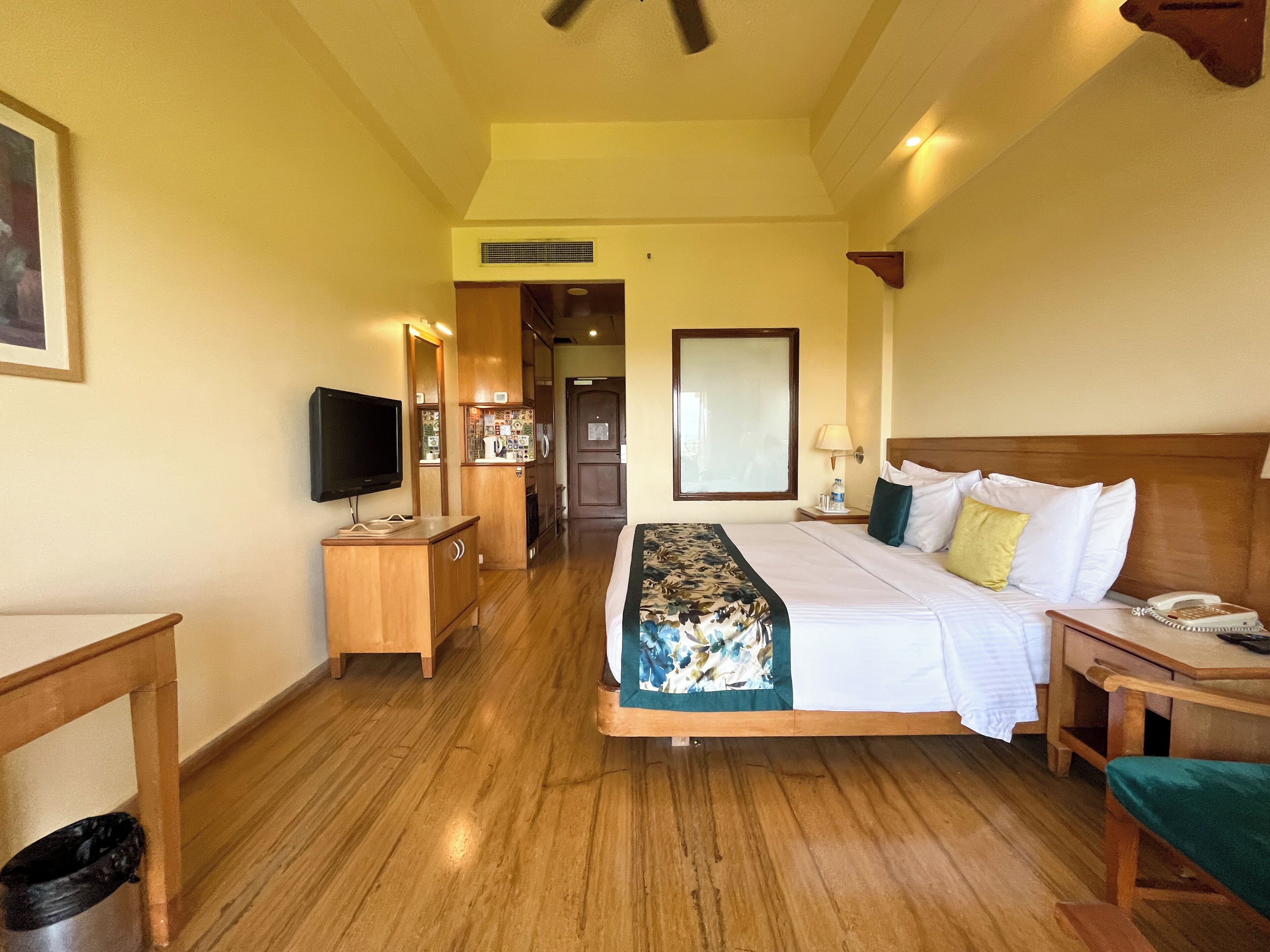 Premier Room, Balcony, Pool View | In-room safe, desk, iron/ironing board, bed sheets