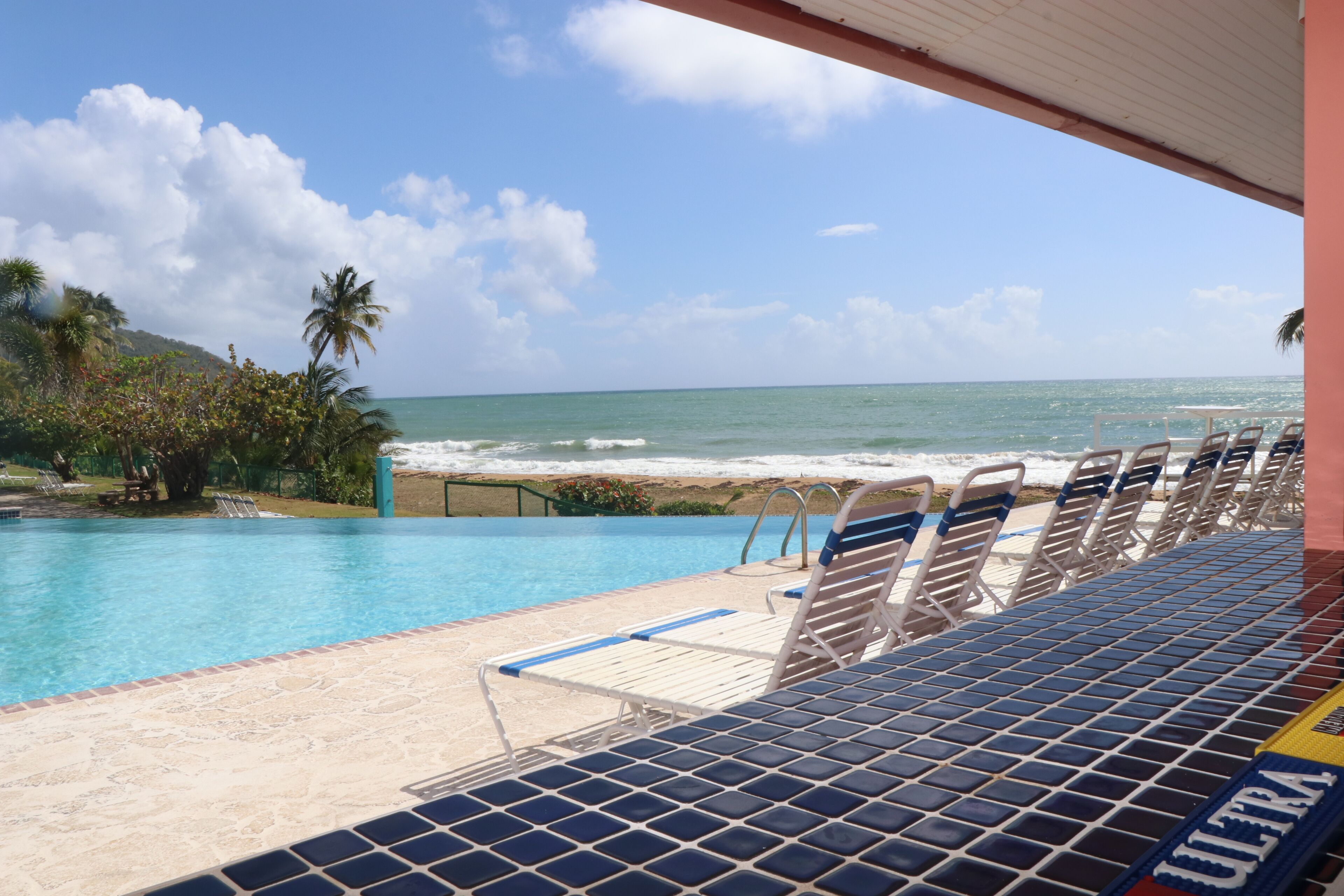 Breakfast, lunch, dinner served; international cuisine, pool views 