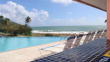 Breakfast, lunch, dinner served; international cuisine, pool views