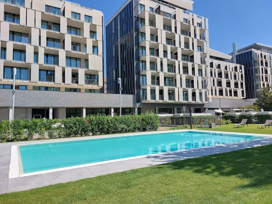 Seasonal outdoor pool, open 9:00 AM to 8:00 PM, pool loungers