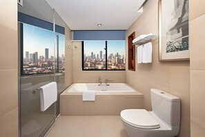 Separate tub and shower, deep soaking tub, free toiletries, hair dryer