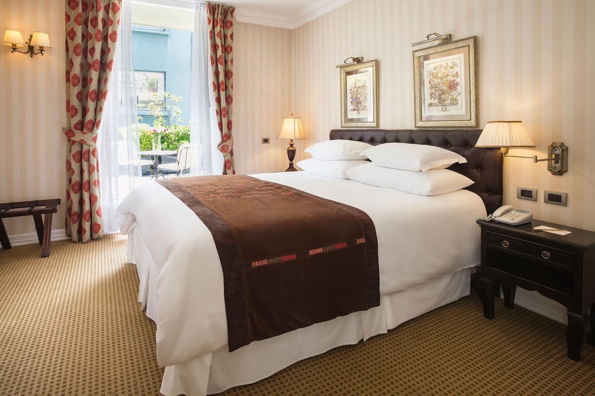 deluxe double room | premium bedding, select comfort beds, minibar, in-room safe