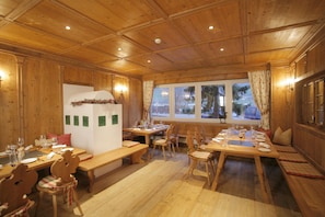 Enjoy dining in this inviting space with a view of the outdoors.