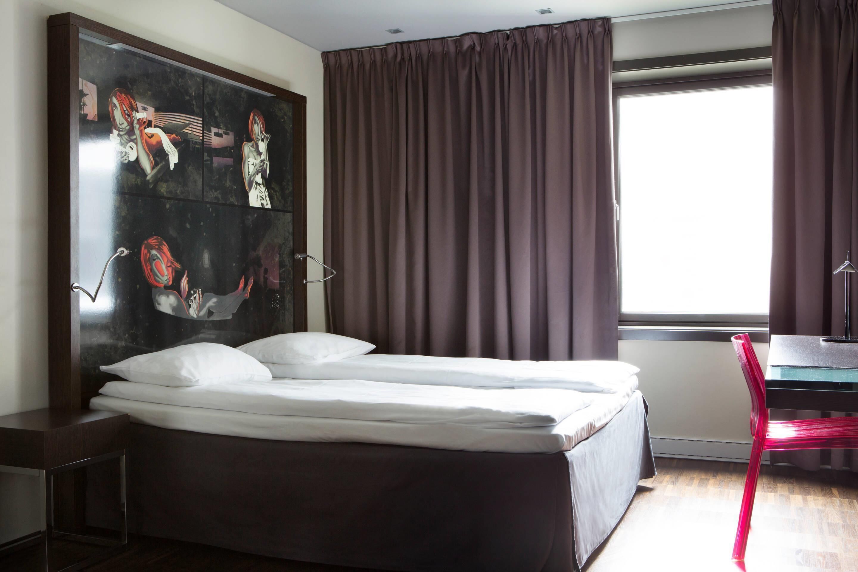 Premium bedding, pillowtop beds, desk, blackout drapes