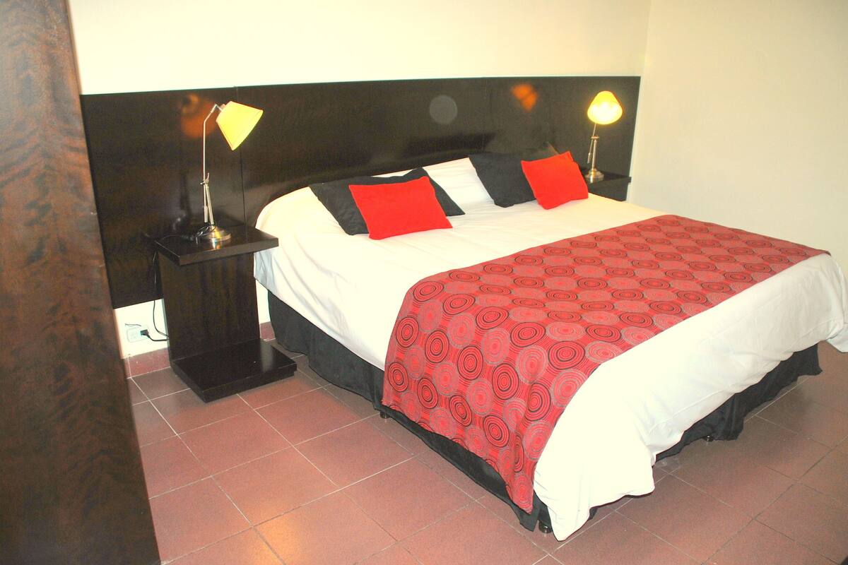 Standard Single Room (outside private bathroom) | Down comforters, in-room safe, desk, blackout drapes