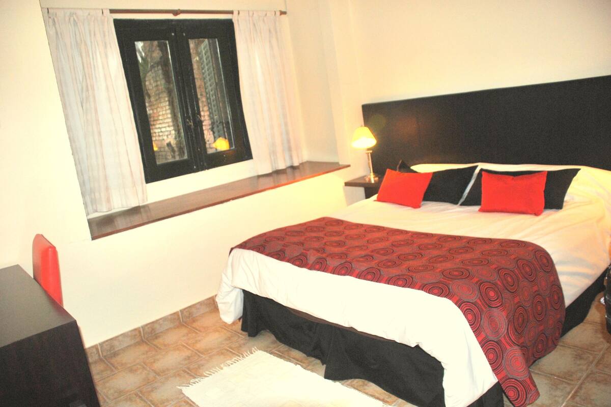 Superior Single Room, Garden View | Down comforters, in-room safe, desk, blackout drapes