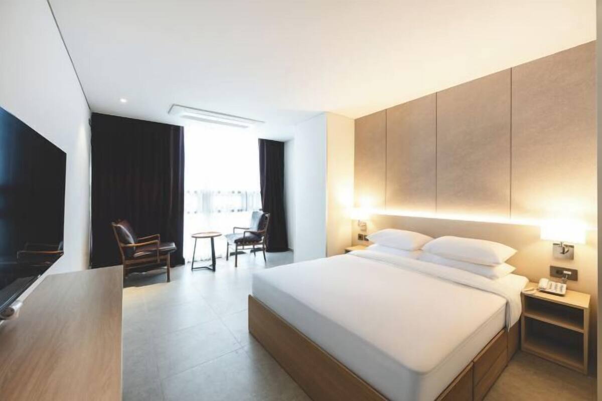 Premium bedding, down duvets, memory-foam beds, minibar