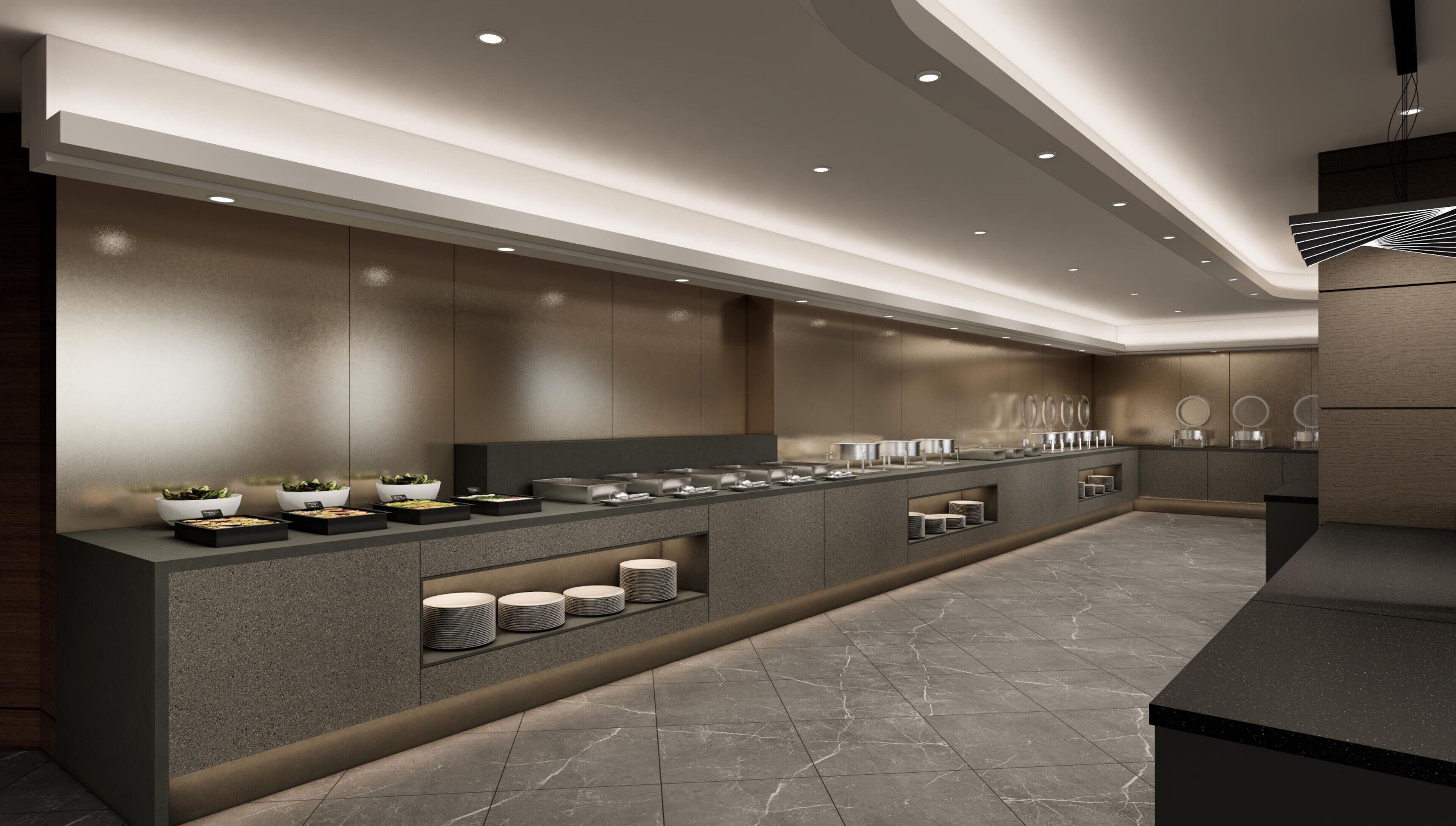 A modern kitchen with a long counter, built-in appliances, and a clean, minimalist design.