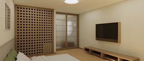 A bedroom with a bed, a TV, a sliding door, and a wooden bench.