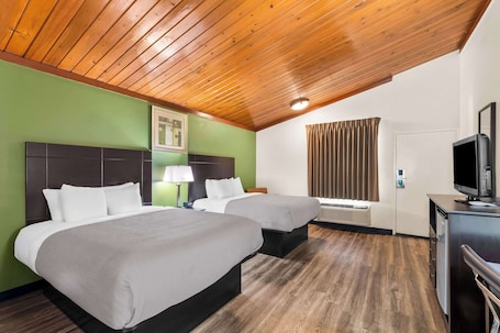 Down comforters, pillowtop beds, desk, blackout drapes