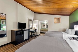 Down comforters, pillowtop beds, desk, blackout drapes