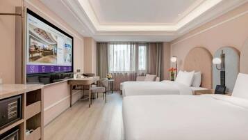 Desk, blackout curtains, iron/ironing board, free wired Internet