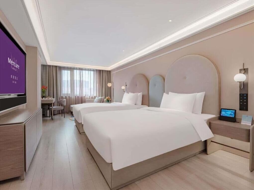 Desk, blackout drapes, iron/ironing board, free wired internet