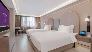 Desk, blackout drapes, iron/ironing board, free wired internet