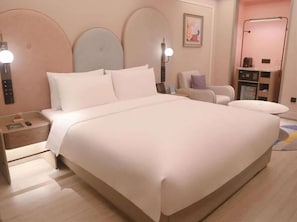 Desk, blackout drapes, iron/ironing board, free wired internet