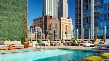 Outdoor pool, sun loungers, lifeguards on site