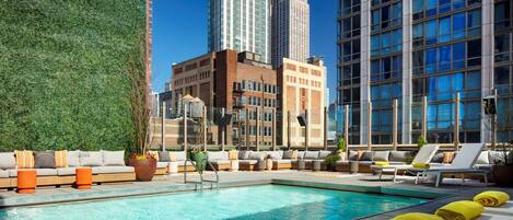 Outdoor pool, sun loungers, lifeguards on site