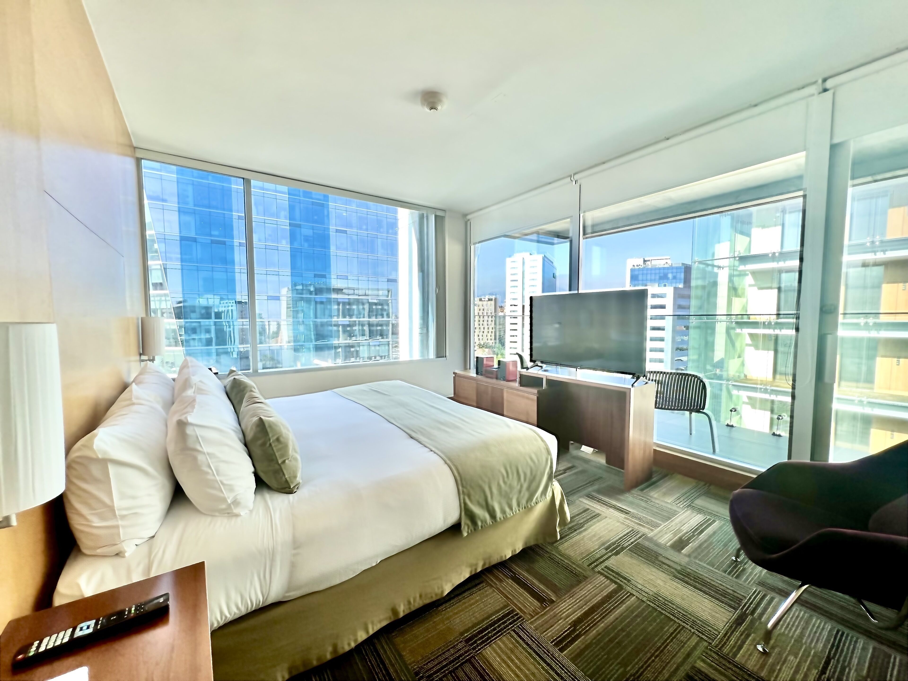 suite, 1 king bed, non smoking, balcony (living room) | minibar, desk, blackout curtains, soundproofing