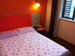 Standard Room, 1 Queen Bed | Desk, blackout drapes, iron/ironing board, free wired internet