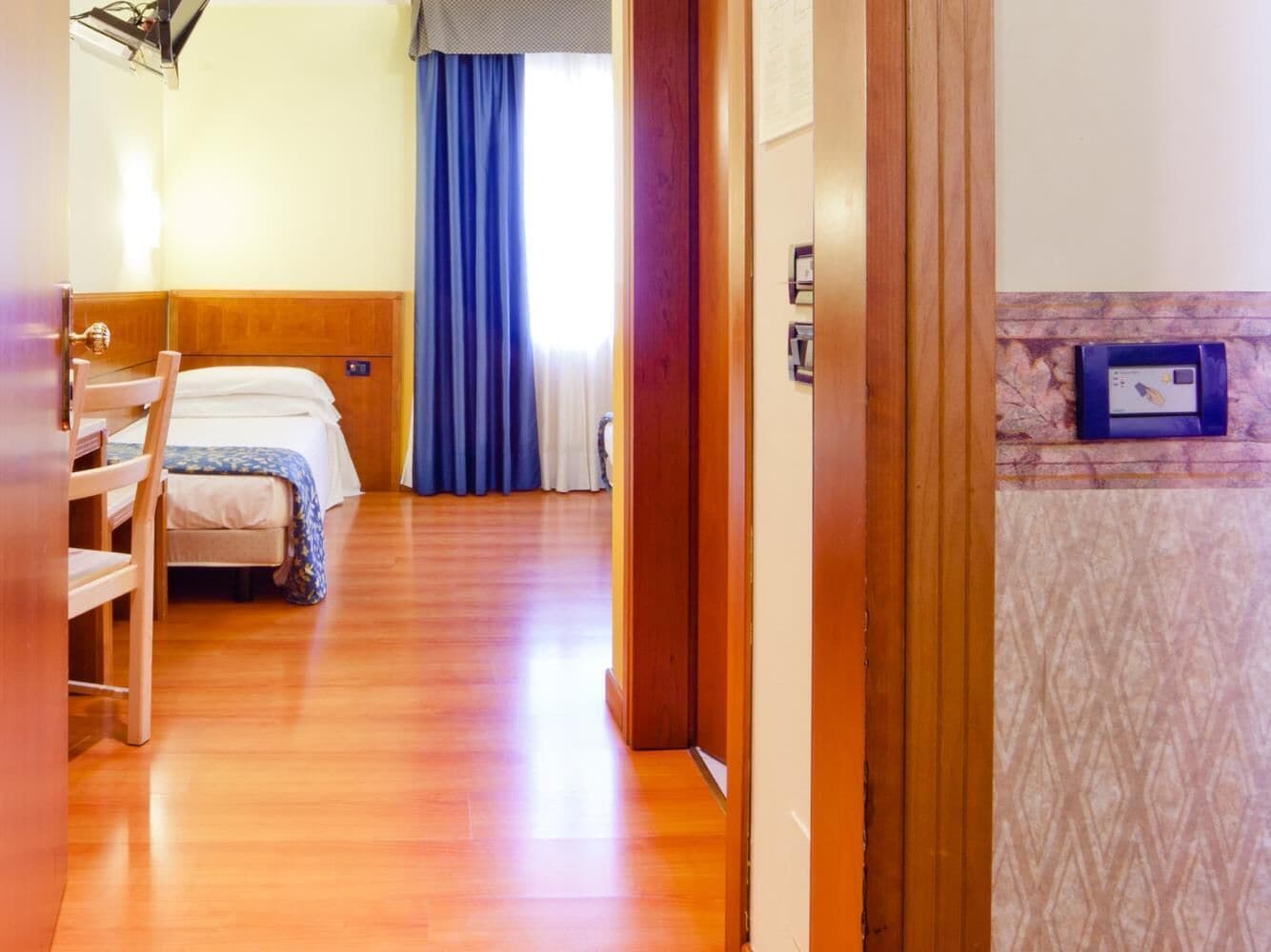 Down comforters, in-room safe, desk, blackout drapes