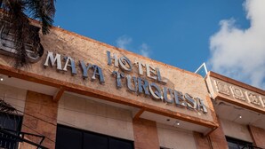 The exterior of Hotel Maya Turquesa with its name displayed prominently on the facade. - Hotel Maya Turquesa - Playa del Carmen (Playa del Carmen)