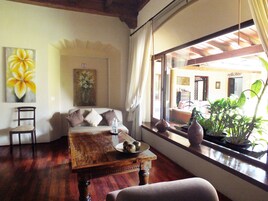 Suite | Living area | 15-inch plasma TV with cable channels, TV