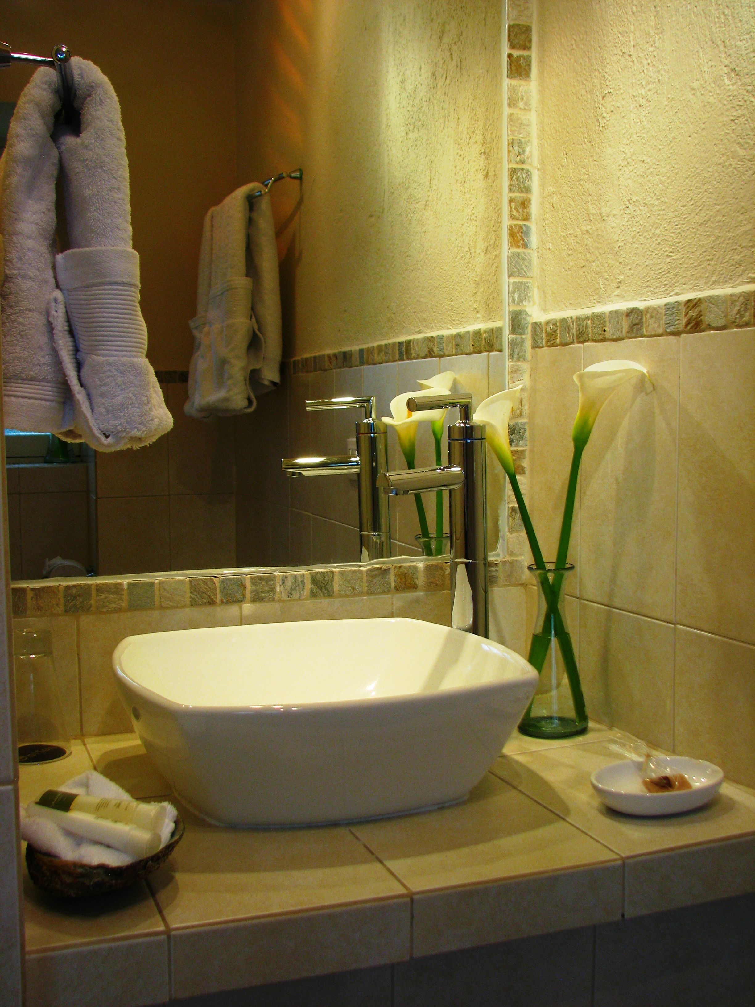 junior suite, 1 king bed - street side | bathroom | shower, free toiletries, hair dryer, towels