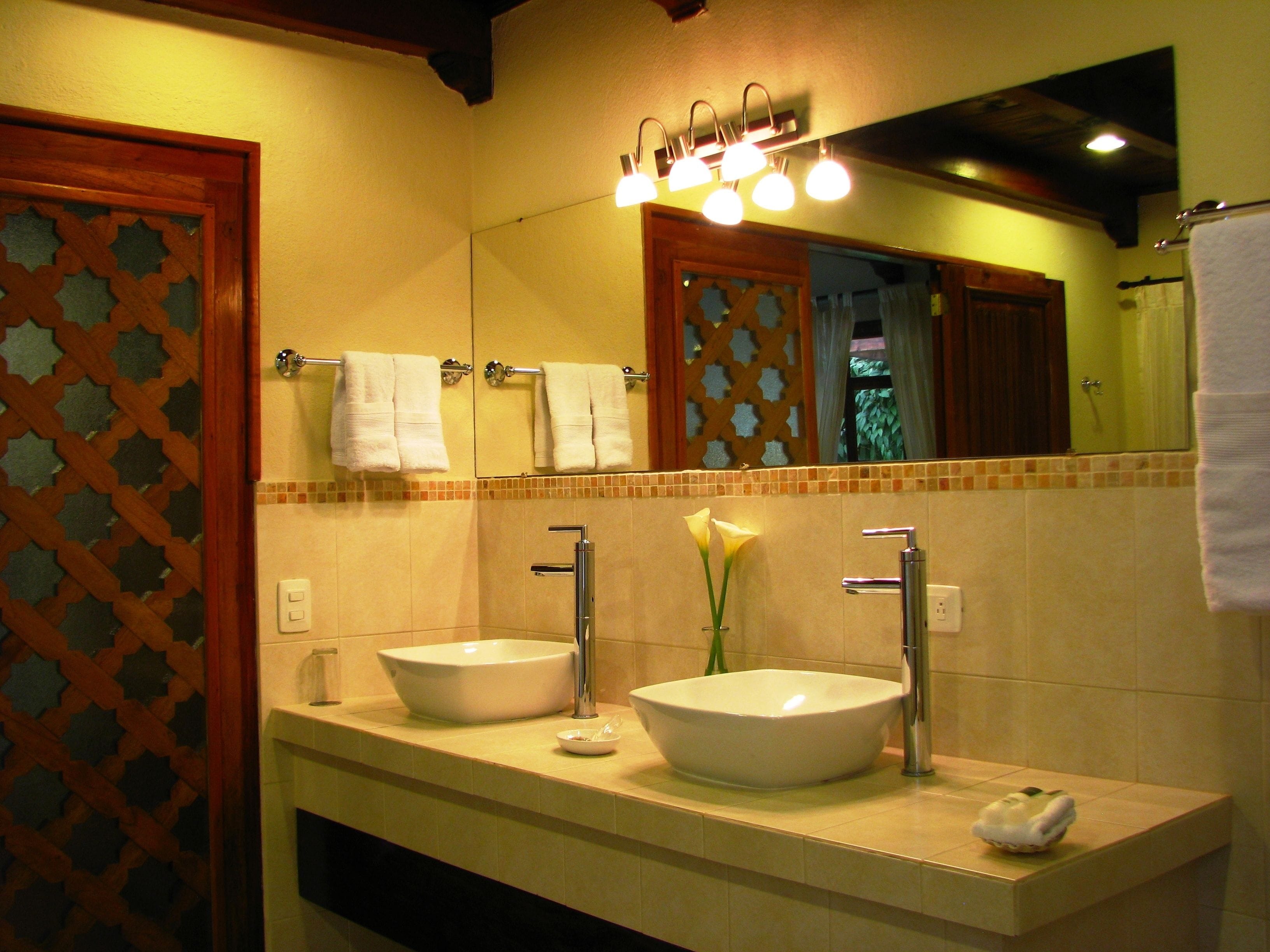 junior room, garden view | bathroom | shower, free toiletries, hair dryer, towels