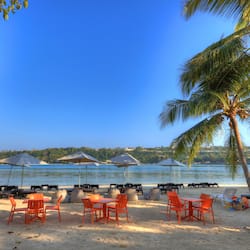 On the beach, white sand, free beach cabanas, sun-loungers