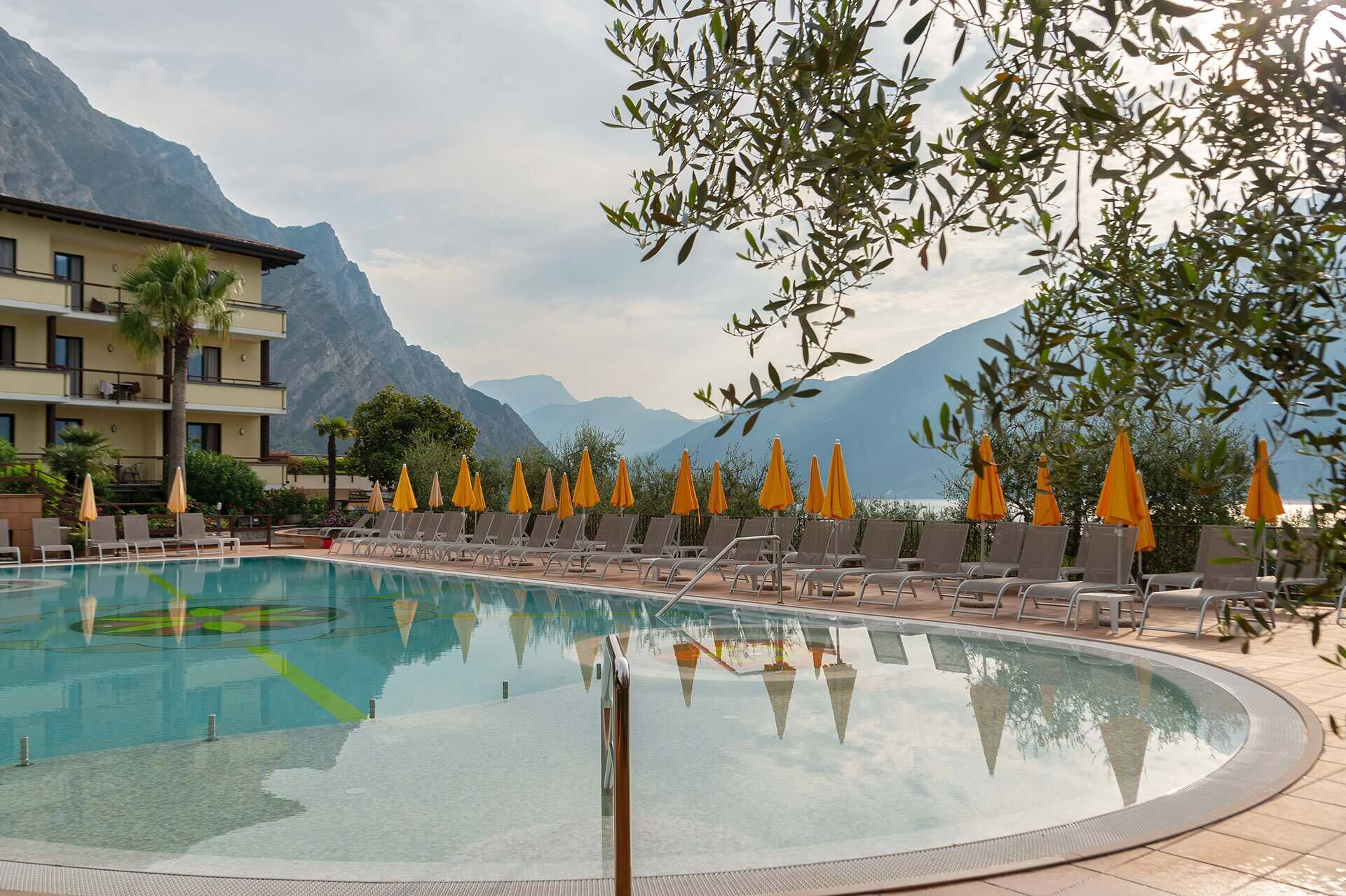 Indoor pool, outdoor pool, open 8:00 AM to 8:00 PM, pool umbrellas