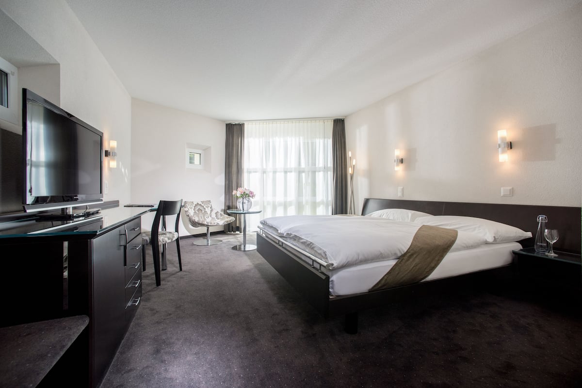 1 slaapkamer, donzen dekbedden, een minibar, een kluis op de kamer