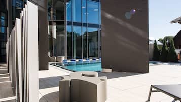 Indoor pool, open 10 AM to 9 PM, pool loungers