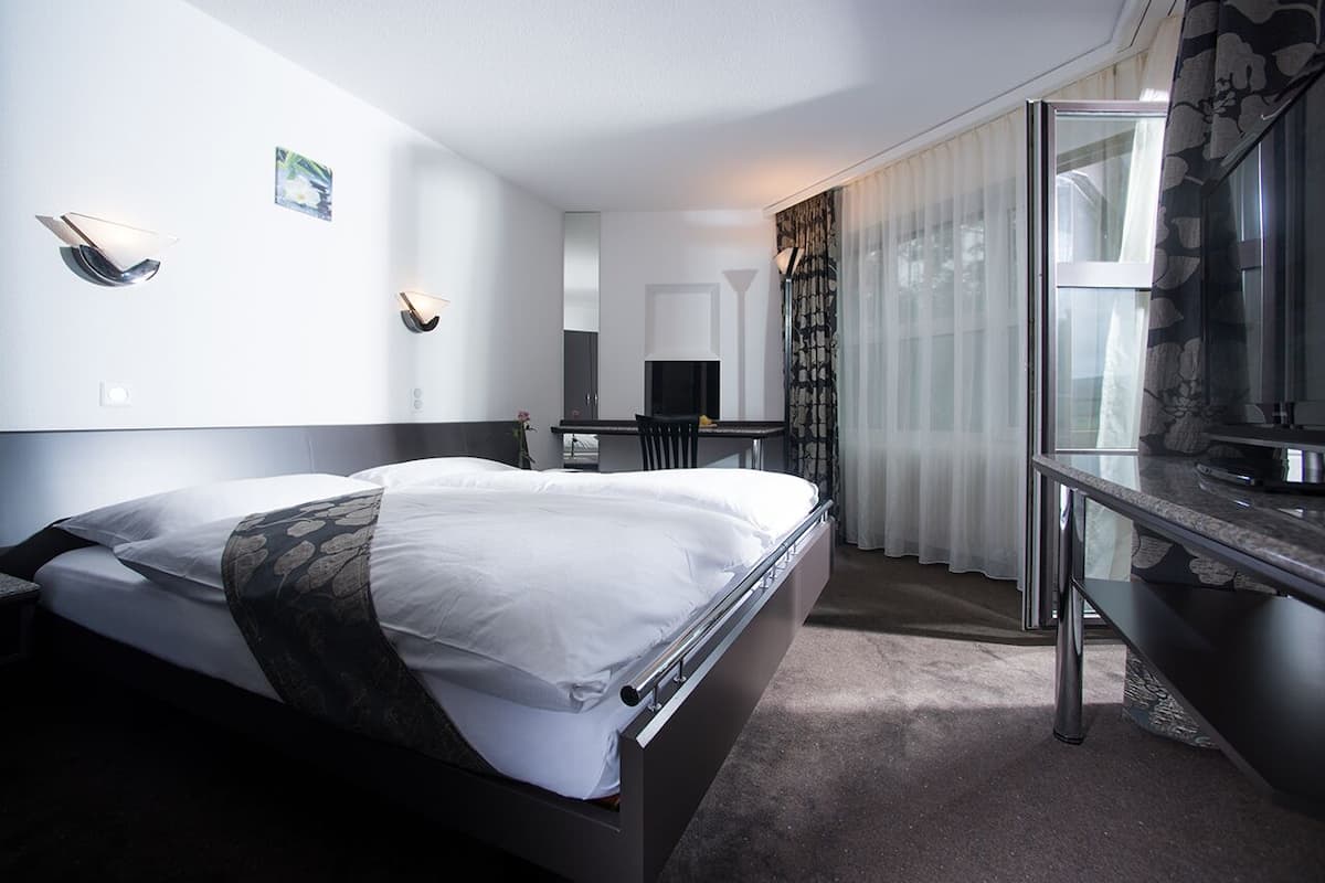 Executive kamer | 1 slaapkamer, donzen dekbedden, een minibar, een kluis op de kamer