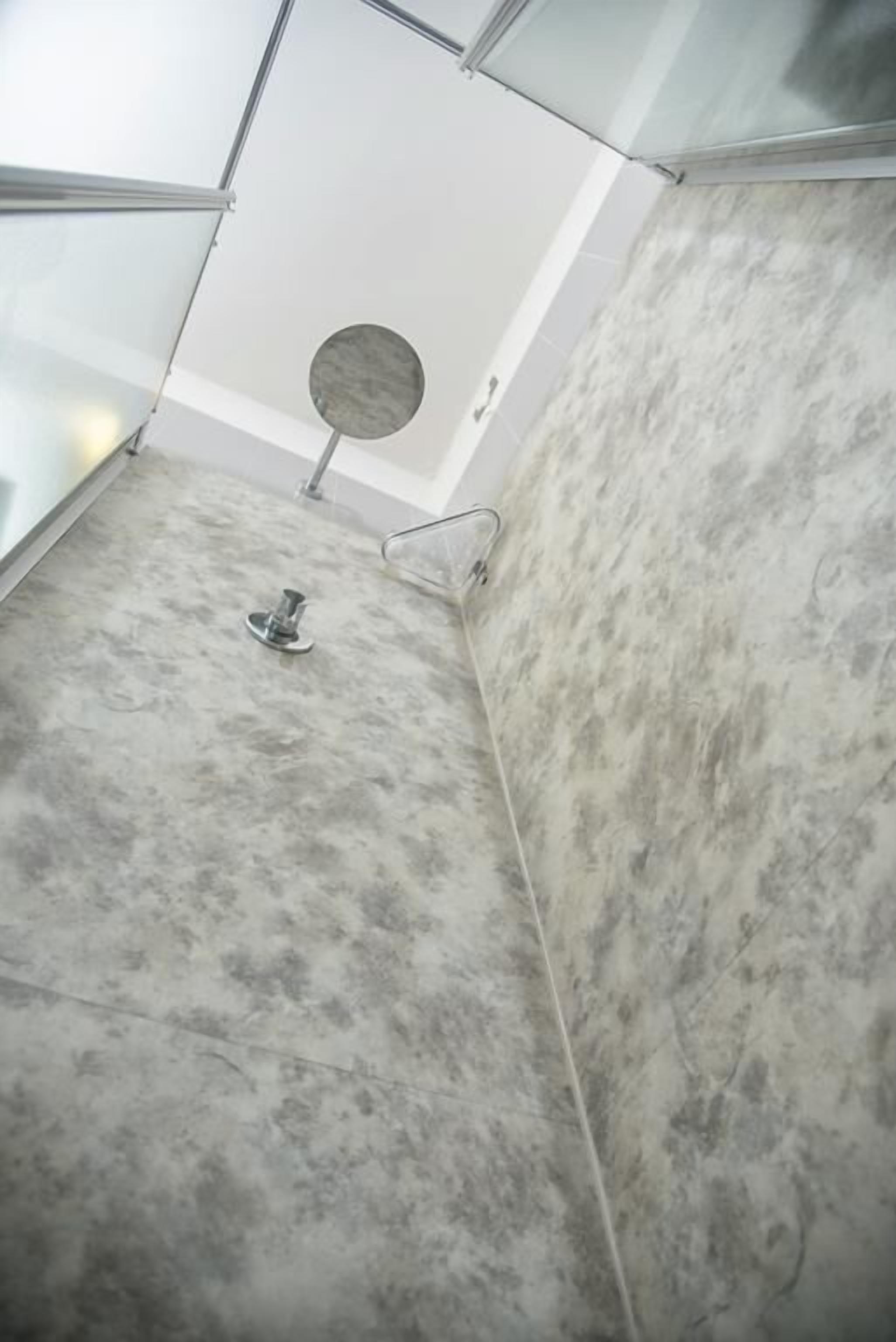 single room | bathroom | rainfall showerhead, free toiletries, hair dryer, slippers