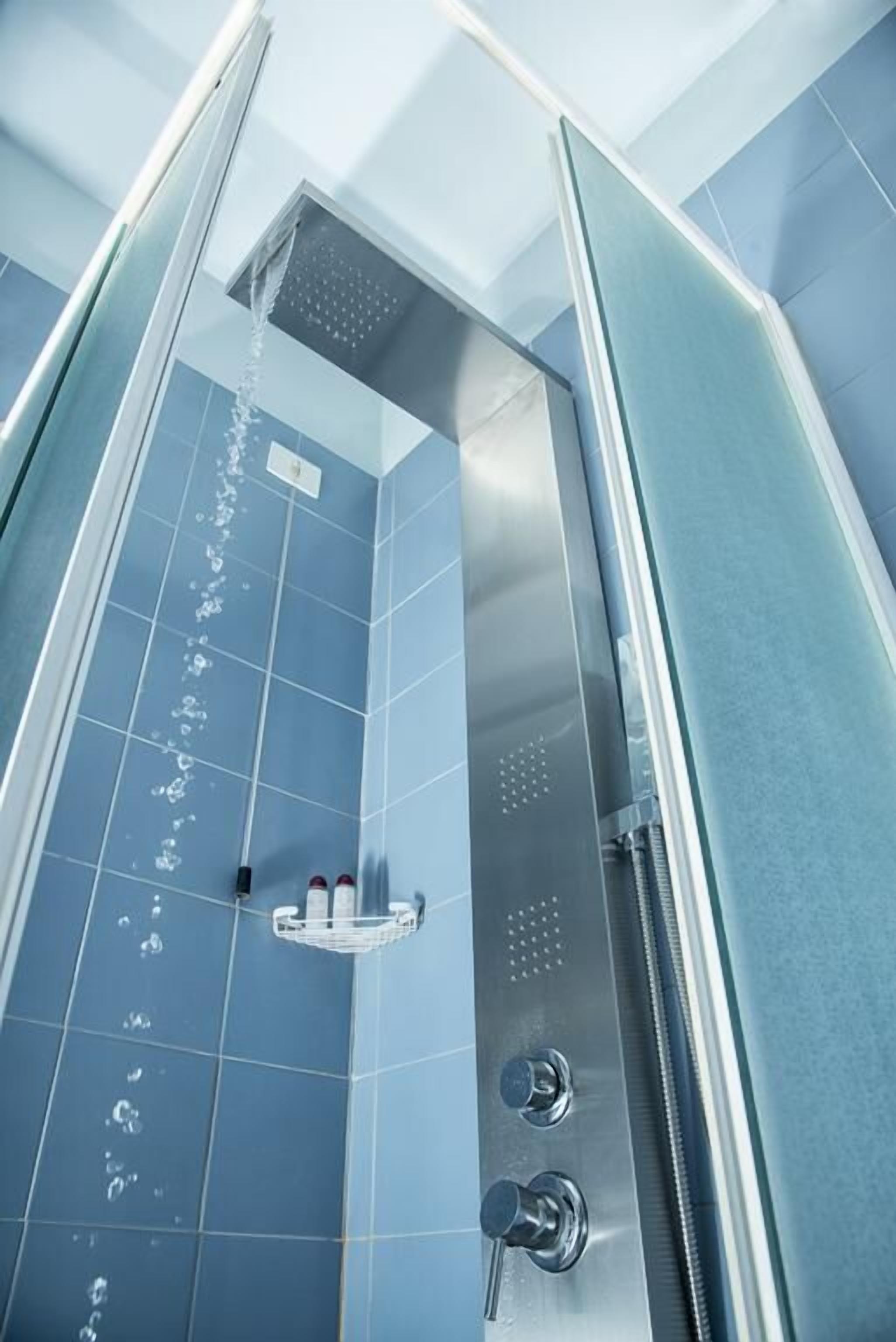 rainfall showerhead, free toiletries, hair dryer, slippers