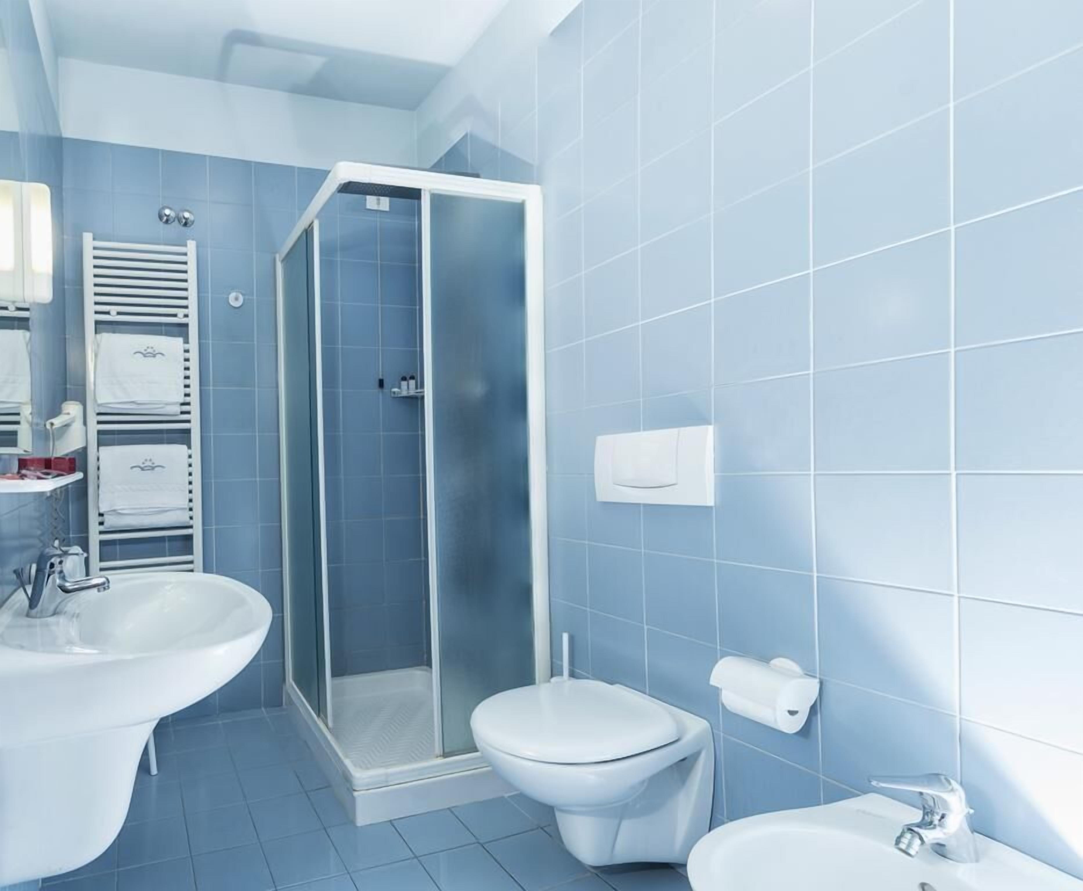 rainfall showerhead, free toiletries, hair dryer, slippers