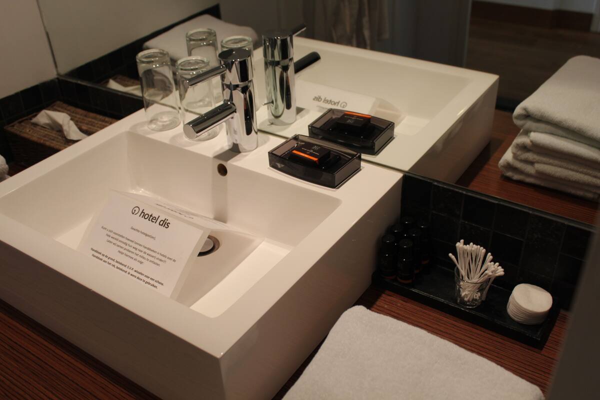 junior suite, bathtub | bathroom | designer toiletries, hair dryer, towels, soap