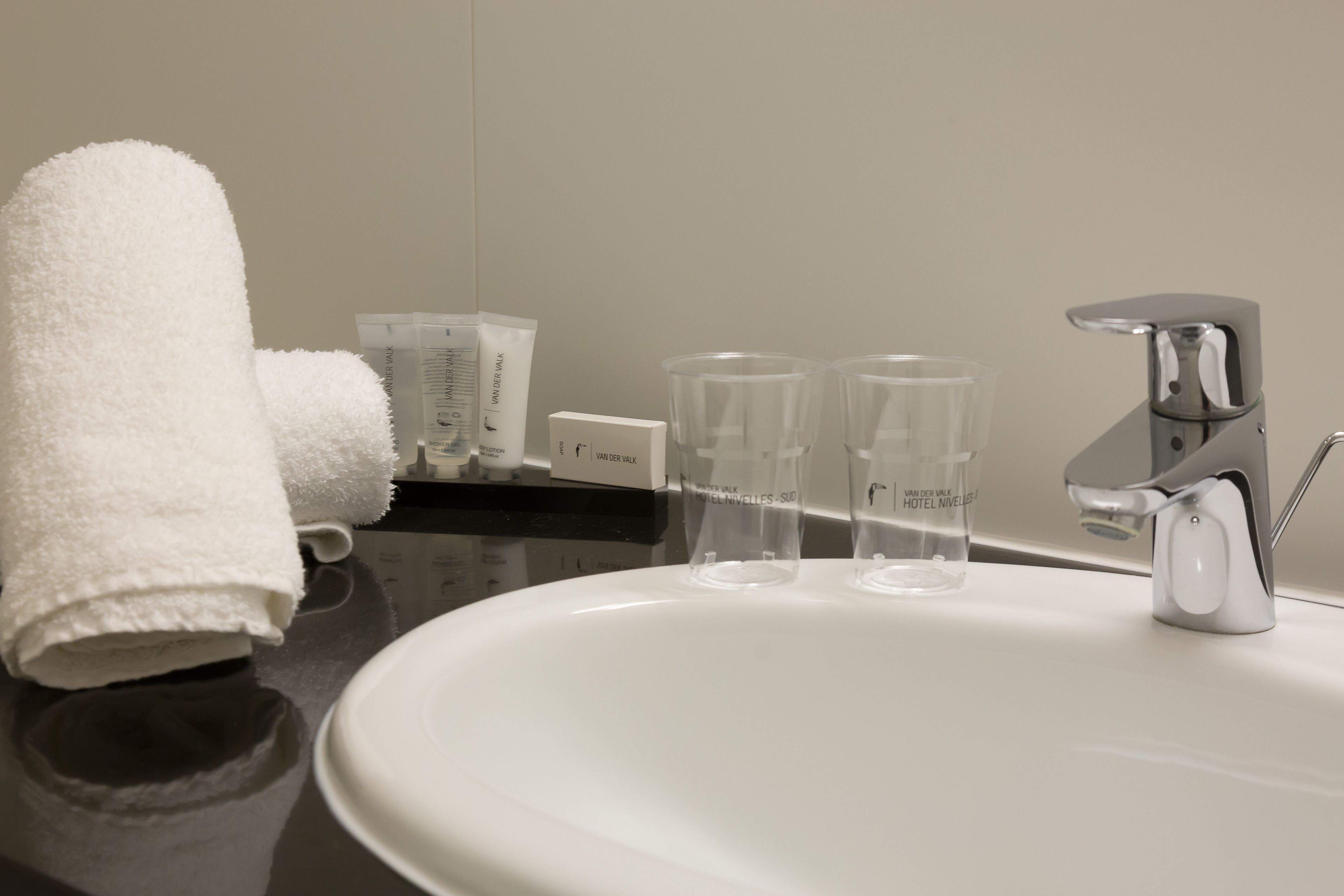 economy double room | bathroom | hair dryer, slippers, towels