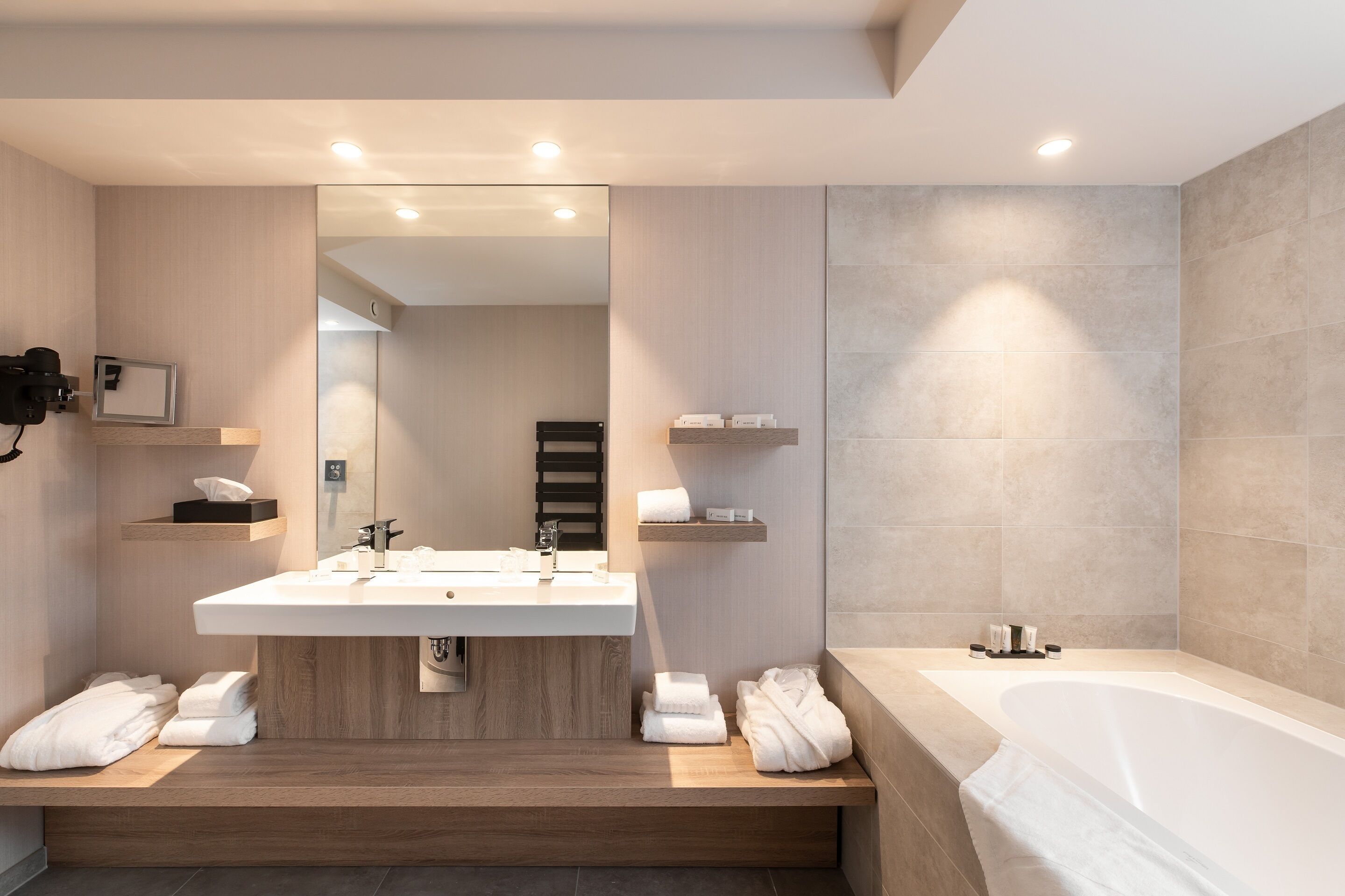 executive suite | bathroom | hair dryer, slippers, towels